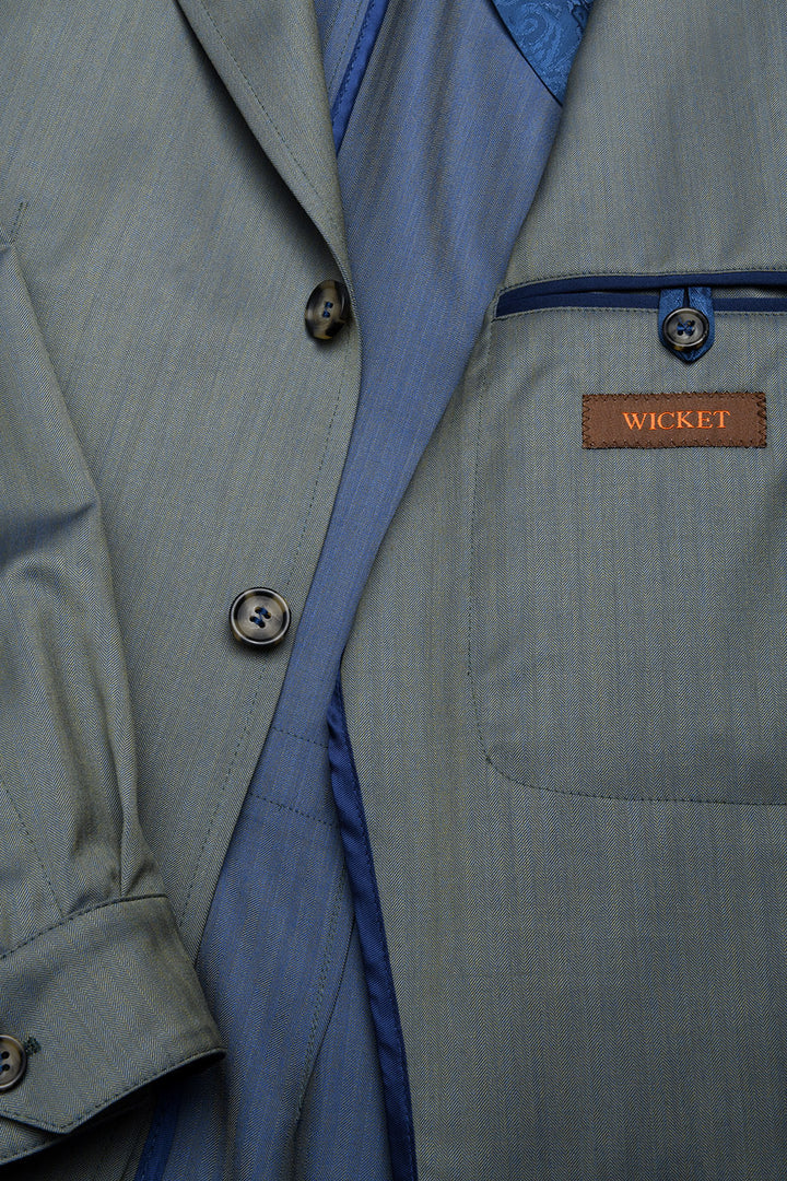The Safari Jacket – Green Solaro herringbone with blue highlights, virgin wool (250 g) – WICKET