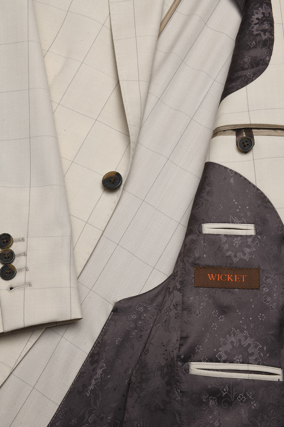 Le Kensington – Herringbone, ivory, with a brown overcheck – WICKET